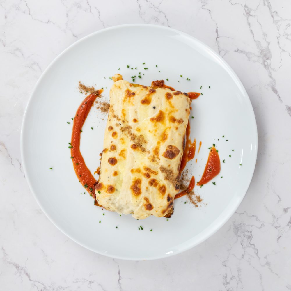 TRAFUS. LASAGNE DE CERDO ESPECIADO